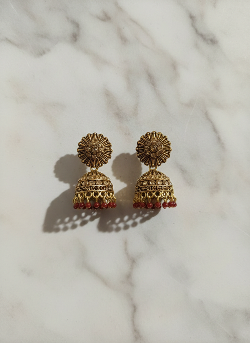 Eluria Antique Gold Floral Jhumka Earrings