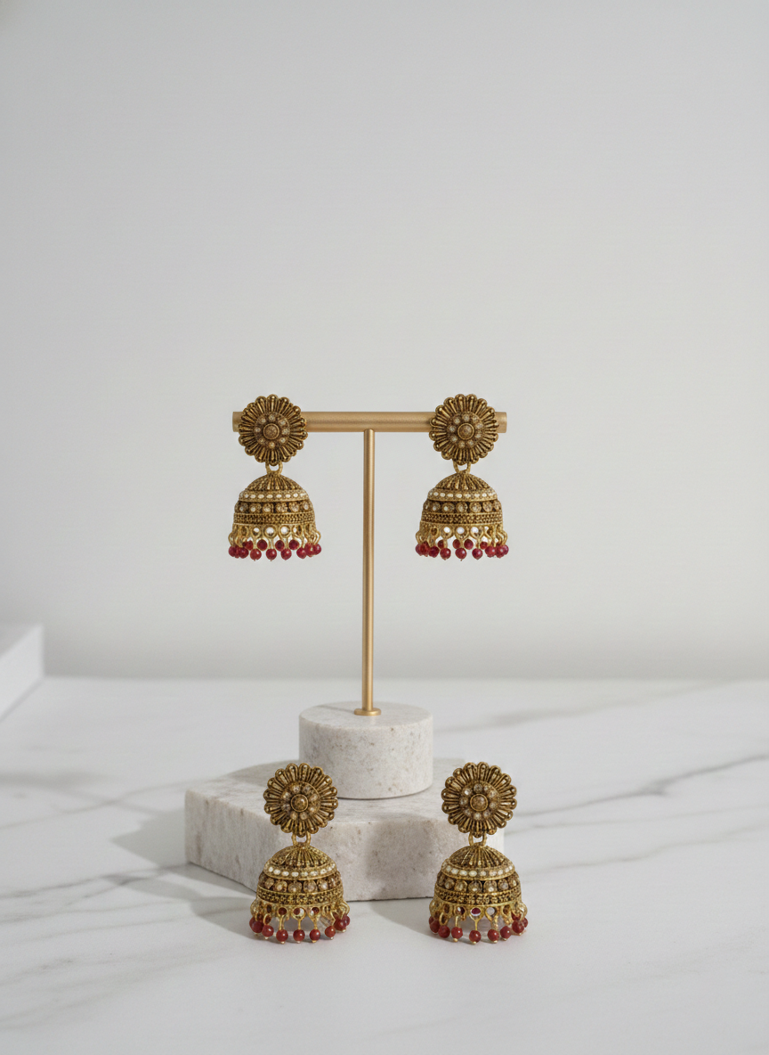 Eluria Antique Gold Floral Jhumka Earrings