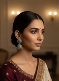 Eluria Blue & Gold Kundan Floral Jhumka Earrings
