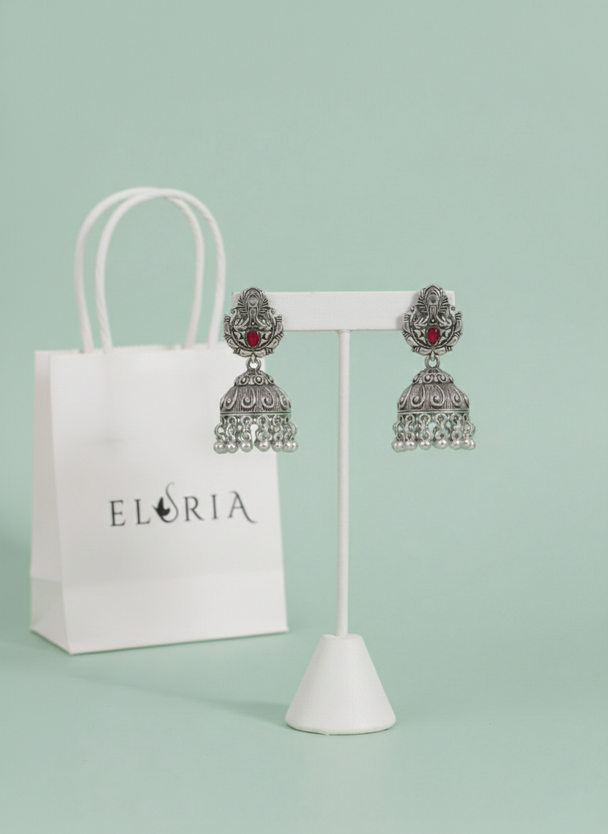 Eluria Oxidized Silver Red Stone Temple Jhumka Earrings