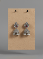 Eluria Oxidized Silver Red Stone Temple Jhumka Earrings
