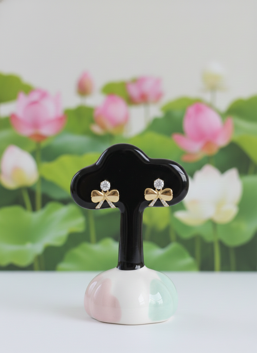Eluria Gold Bow Crystal Stud Earrings