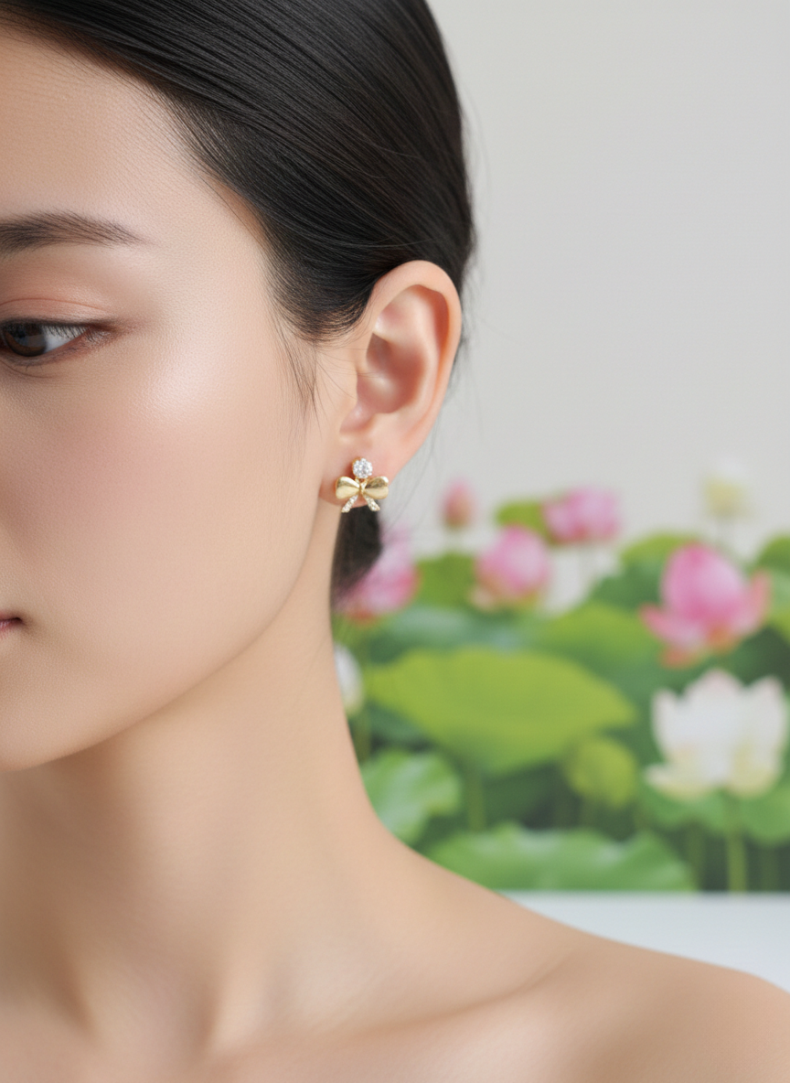 Eluria Gold Bow Crystal Stud Earrings