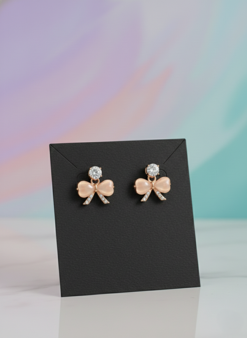 Eluria Gold Bow Stud Earrings